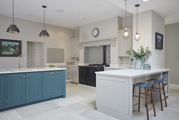 A beautiful contemprary kitchen with an abundance of space and an Aga oven on display